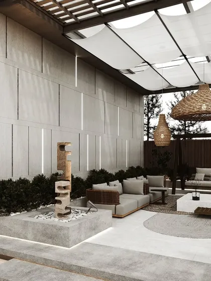 This angle captures the interplay of light and shadow created by the fabric canopy and the slatted wall, adding visual interest to the space.