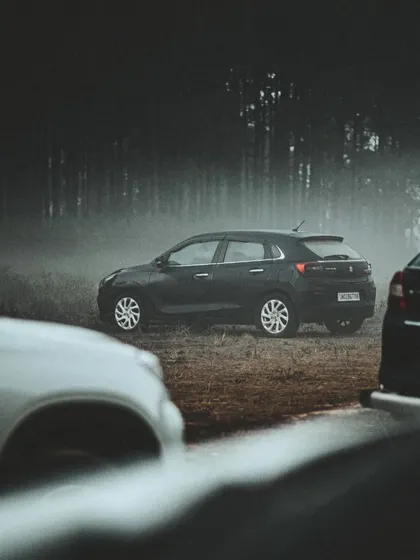 Fog and forests create an incredible atmosphere. This shot of a Maruti Suzuki Baleno uses the moody, mysterious environment to build drama and create a memorable, cinematic brand visual that tells a story.