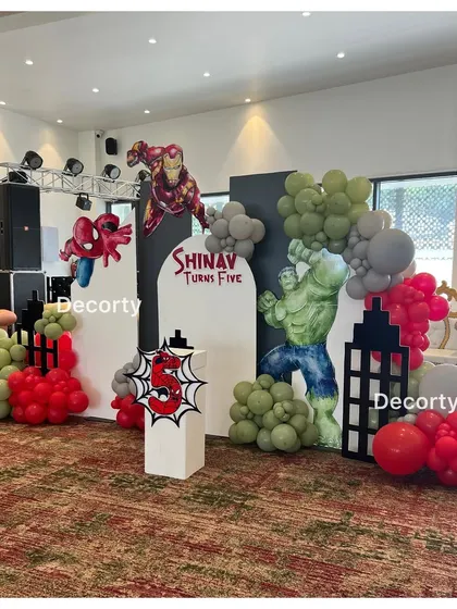 The Avengers-themed birthday backdrop, ready for an action-packed celebration for a young superhero fan.