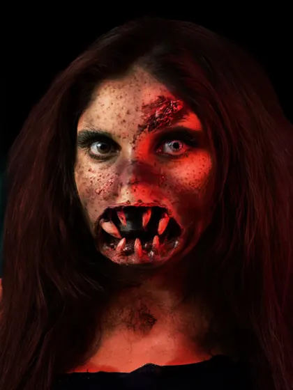 A terrifying zombie look with prosthetic teeth, created by one of our talented students. Our SFX course covers the creation and application of simple prosthetics.