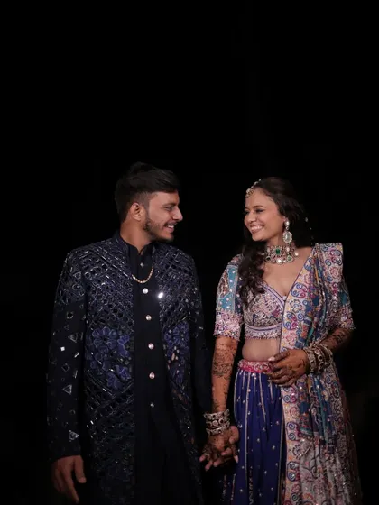 A perfect couple portrait from their Sangeet and Dandiya night.