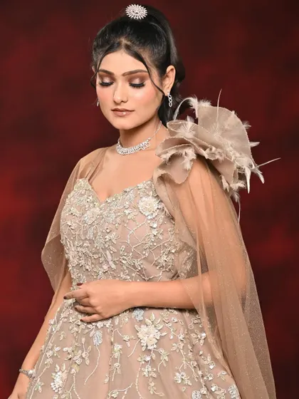 A full view of the spotlight makeup look. It pairs beautifully with a high ponytail and an elegant gown.