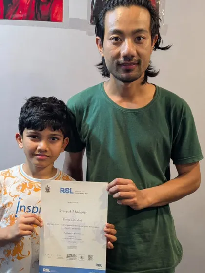 Congratulations to Samyak for acing the RSL Acoustic Guitar graded exam with Merit! Your hard work and passion shine through every note.