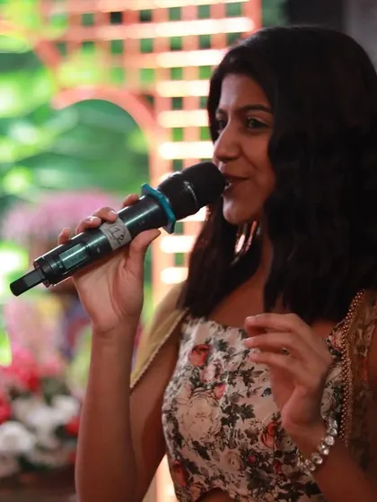 A close-up of me hosting a Mehendi, showing my expressive and engaging style.