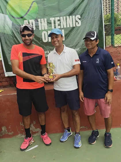 Our Masters players taking the stage at the Ad In Tennis Open. It's great to see our adult competitive players succeeding in tournaments.