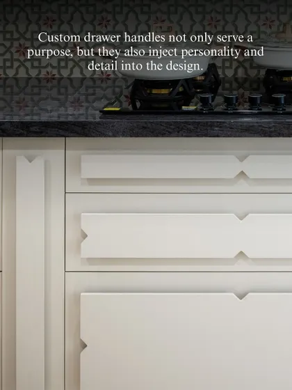 Custom drawer handles are an opportunity to inject personality and detail into a design. These unique, geometric handles serve their purpose while also acting as a subtle, artistic element in the kitchen.