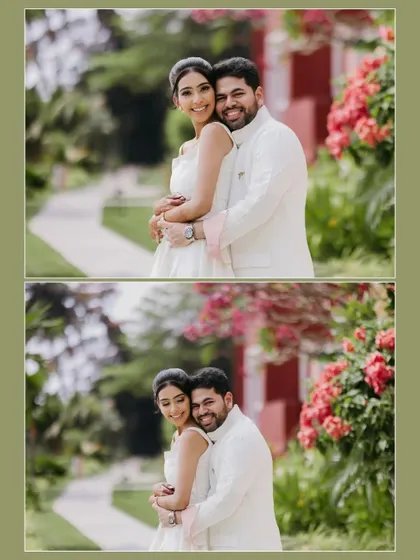 A classic, happy portrait of the groom hugging the bride from behind, both smiling warmly at the camera in a lush garden.