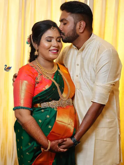 A gentle kiss on the forehead is a simple but powerful expression of love. I captured this intimate moment between the couple during their baby shower event.