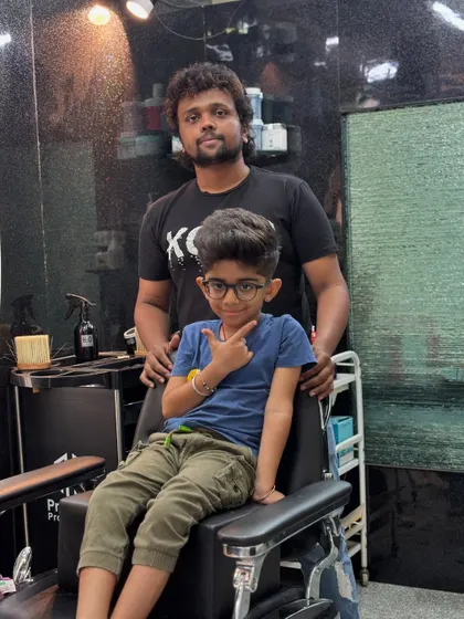Agniv giving a cool pose after his haircut.