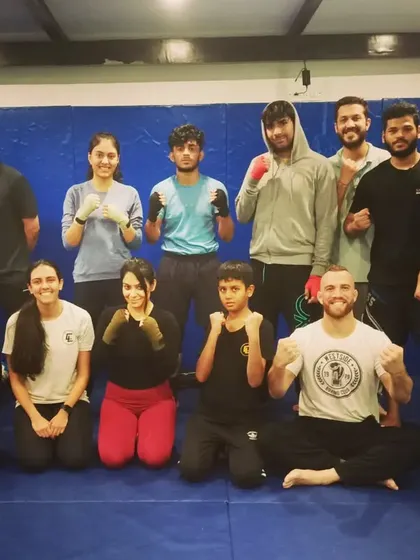 A group photo after a tough kickboxing class with Coach Seth. We work hard, learn a lot, and always end with a sense of accomplishment and team spirit.