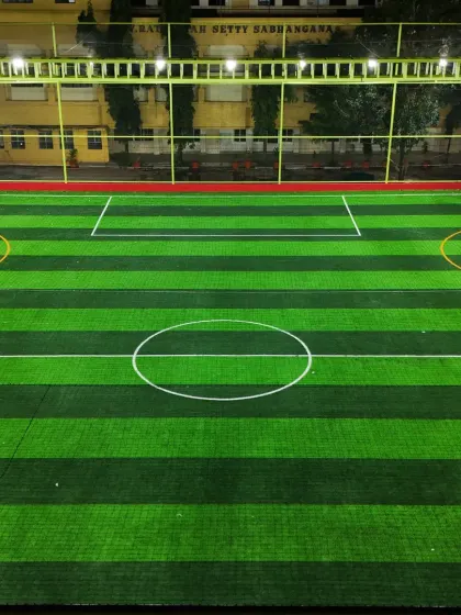 The JP Nagar turf lit up for evening games. We ensure our facilities are well-lit and safe for you to play after the sun goes down.