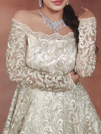 Your jewellery should match your modern style. This delicate American Diamond necklace is perfect for a reception or cocktail gown, providing a touch of sparkle without overpowering an elegant off-the-shoulder dress.