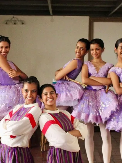 Backstage camaraderie during "The Nutcracker." Our productions bring together dancers of different levels, creating a strong sense of community and shared purpose.