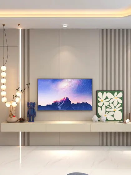 The TV and media unit in the kid's room is designed with clean lines, fluted panels, and fun decor pieces.