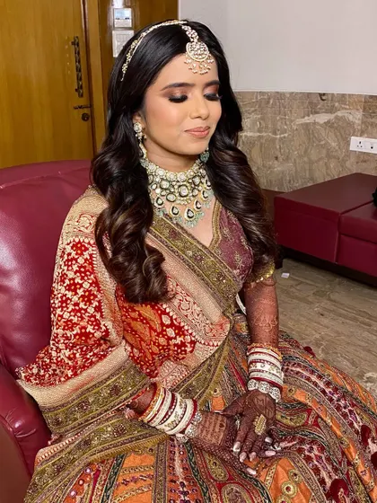 A close-up of Twinkle's dreamy wedding look. The soft glam makeup enhances her features, making her look absolutely radiant.