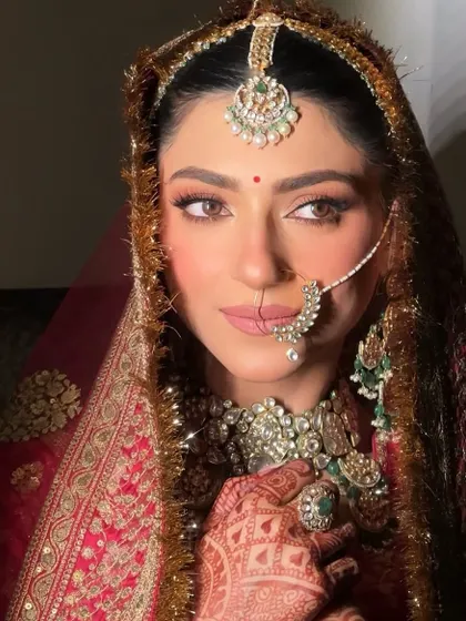 Looking like an absolute dream for her big day. My beautiful bride Sugandh in a classic Sabyasachi ensemble with soft, glowing makeup.