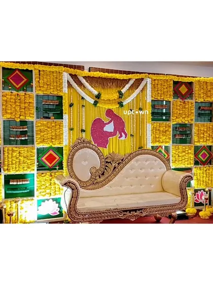 A close-up of the traditional stage couch.
