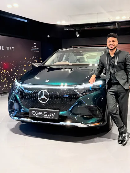 Posing with the stunning Mercedes-Benz EQS SUV. Performing for a brand synonymous with luxury and performance is always a thrill, and this was one of 14 incredible shows I've done with them.