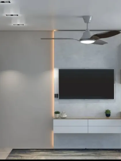 A bedroom with a floating TV console and a compact, floating study desk.