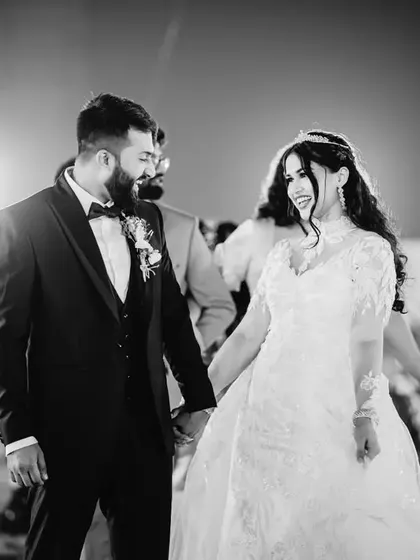A candid black and white shot of the couple sharing a look on the dance floor. These are the small, intimate moments I look for throughout the day.