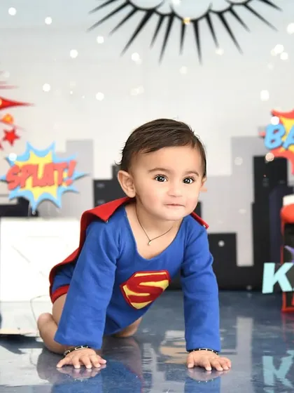 Our little hero is ready to crawl into action and save the day. The Superman theme is a fantastic way to capture your toddler's adventurous spirit.