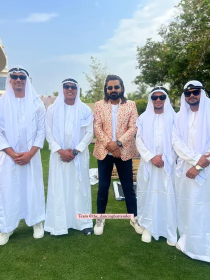 Leading my team at an Arabian-themed party. We believe that committing to the theme, from our outfits to the drinks, makes the event truly immersive and special.
