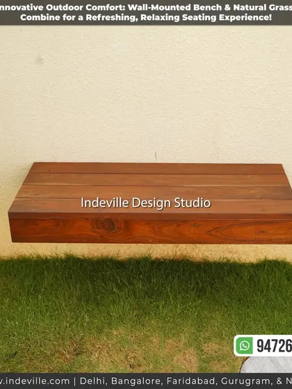 A close-up of the floating wooden bench, a custom piece that adds a modern and space-saving seating solution to the garden.