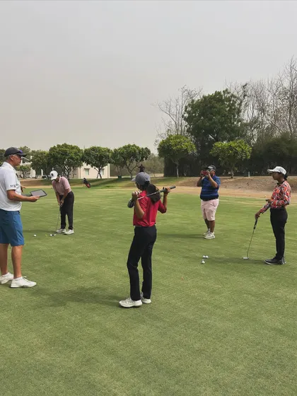 A putting session during the Junior Asian Golf Academy summer camp.