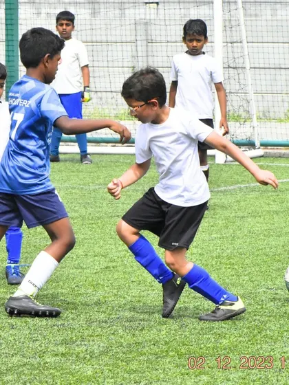 Celebrating our U-9 team's championship win at the Mega International Football Tournament. These moments of victory are what our young athletes train for.