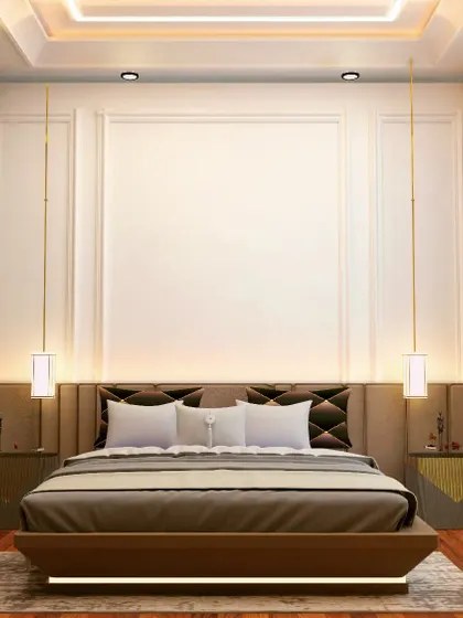A 3D concept for a bedroom that exudes classic elegance. The design features traditional wall molding, a low-profile bed with a quilted headboard, and long pendant lights that add a touch of modern sophistication.