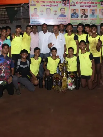 The full sub-junior squad with coaches and their collection of trophies after winning the tournament.