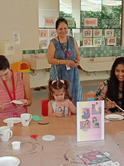 A mother and daughter enjoying the creative process at our Mother's Day decoupage workshop.