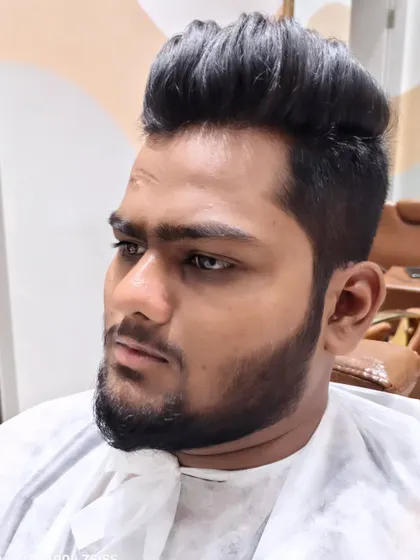 Another angle of the client's new haircut and beard style.
