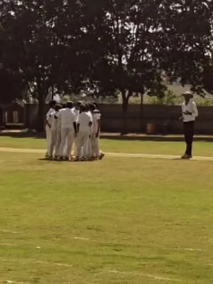 Another view of the team huddle during a match.