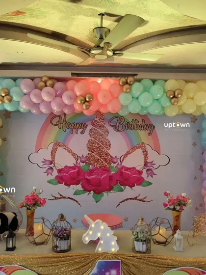 A close-up of the unicorn backdrop with a glittery horn.