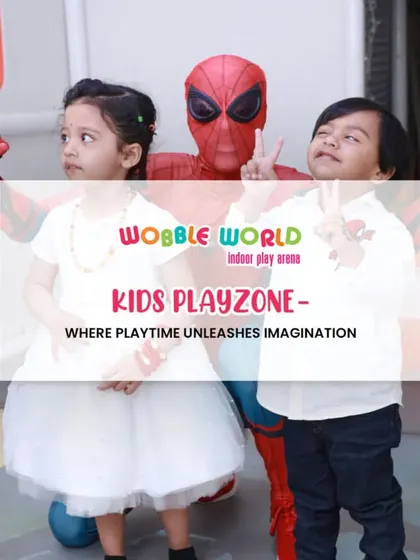 Two children posing with Spiderman, one giving a peace sign. Our playzone is where playtime unleashes imagination.
