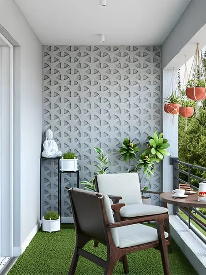 A minimalist design for a peaceful morning coffee. Two simple chairs and a small table are all that's needed to enjoy the serene view of the trees, with a textured accent wall adding subtle interest.