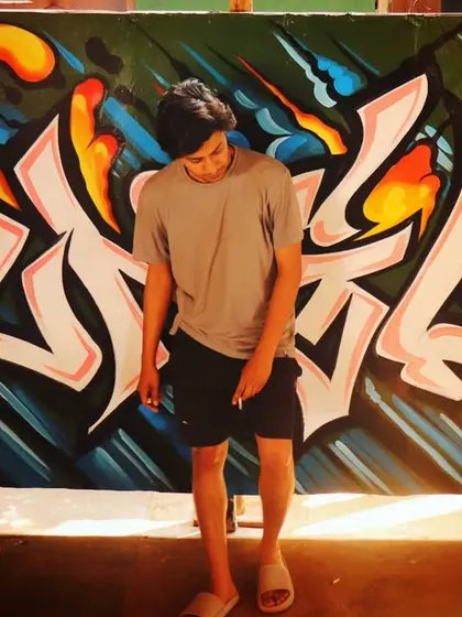 A custom graffiti piece for a jungle-themed space in Ashwem, Goa. The wildstyle lettering and vibrant colors contrast with the natural surroundings to create a unique vibe.