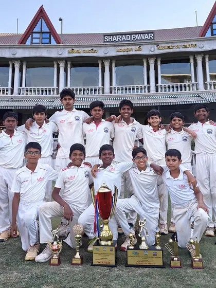 A victory pose at the Sharad Pawar Recreation Centre, MCA BKC, with the spoils of a hard-fought tournament win.