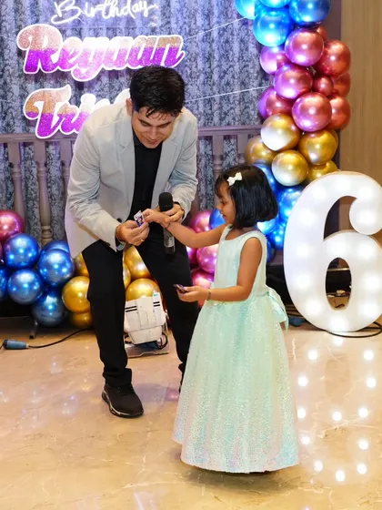 A sweet moment with the birthday girl. Making the star of the show feel special is my top priority.