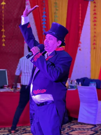 Addressing the audience from the stage during a performance. A good magician is also a good showman, and I make sure to connect with my audience throughout the show.