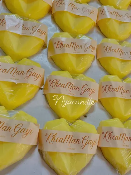 For a fun Mehendi favor, we created these heart-shaped soaps with a custom tag featuring the wedding hashtag.