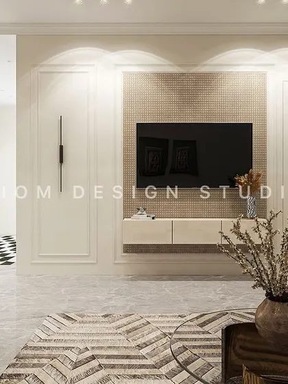 A floating media unit is set against a wall with classic panel molding. This blend of modern furniture and traditional architectural details is key to our contemporary neoclassical style.