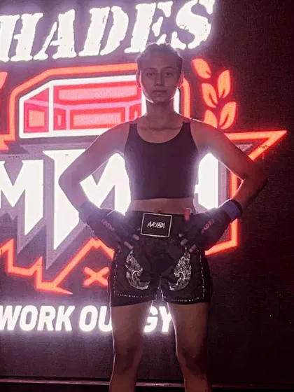 A portrait of one of our female champions, ready for her fight. This is the look of confidence.
