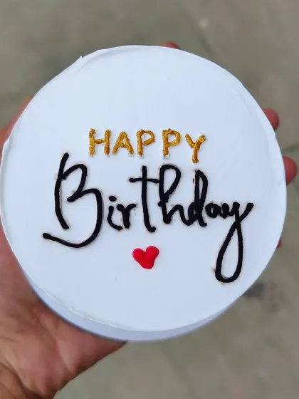A classic happy birthday bento cake with elegant calligraphy.