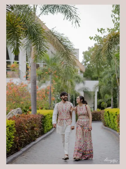 A casual stroll through the beautiful pathways of a resort in Udaipur. A perfect, relaxed couple portrait.