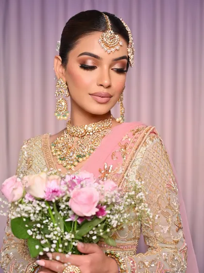 A beautiful portrait holding a bouquet, capturing the romantic and poetic feel of this look.
