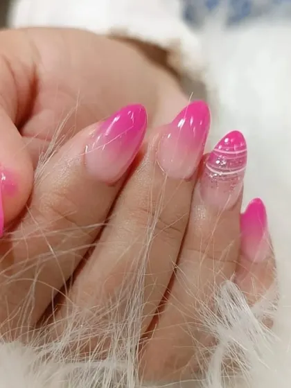 A close-up of our pink ombre and line art design, showing the detail and precision of our work.