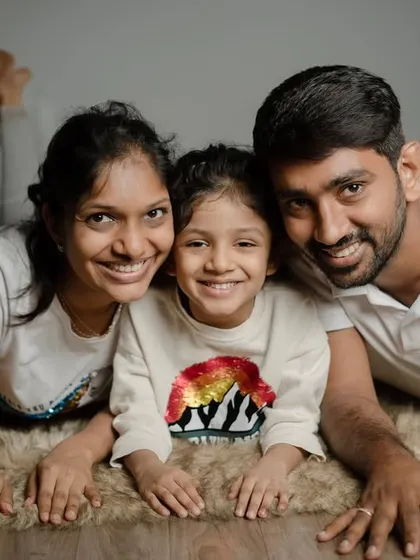 A classic family portrait with a relaxed feel. This image from a studio session with Jiyansh and his parents shows the warmth and happiness of their family, a simple and timeless keepsake.