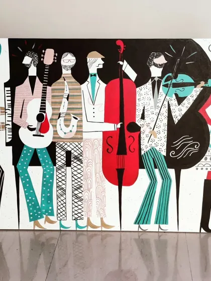A full view of the completed musical artwork, showcasing the dynamic composition and vibrant color palette. This piece is a great example of a custom, themed canvas for a specific interior design.